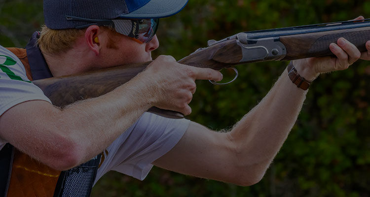 shooter aiming shotgun