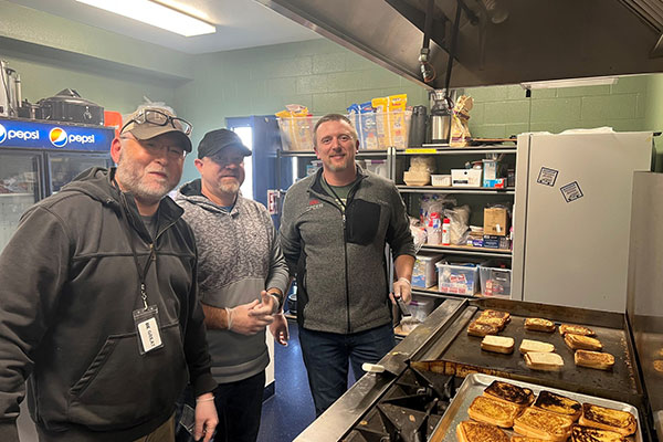 Primers Team (Left to Right: Shawn, Randy and Chris) report to grill up some sandwiches.